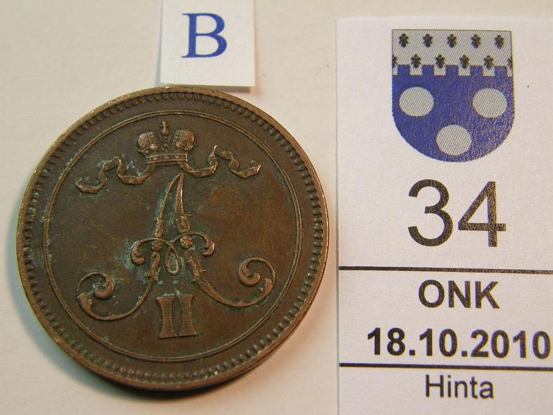 kohde_034_b.jpg - Kohde 34, tunnuspuoli, lhthinta: 60 € 10 p 1865 tumma patina, hieman likaa, varsin hyv tlle vuodelle, kunto: 6.