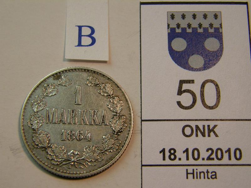 kohde_050_b.jpg - Kohde 50, arvopuoli, lhthinta: 100 € 1 mk 1864 SNY 397.2, hpja, l.puhd, kunto: 4/5.