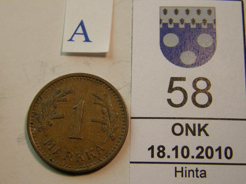 kohde_058_a.jpg - Kohde 58, arvopuoli, lhthinta: 5 € 1 mk 1940 Cu, kunto: 5.