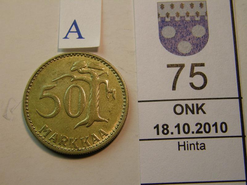 kohde_075_a.jpg - Kohde 75, arvopuoli, lhthinta: 30 € 50 mk 1958 leimakiiltoa, kunto: 6.