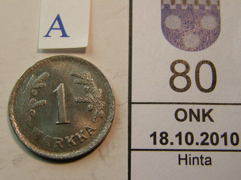 kohde_080_a.jpg - Kohde 80, arvopuoli, lhthinta: 5 € 1 mk 19?? Fe. Vajaa lynti, koko oikea sivu kolikosta puutteellinen, kunto: 7/6.