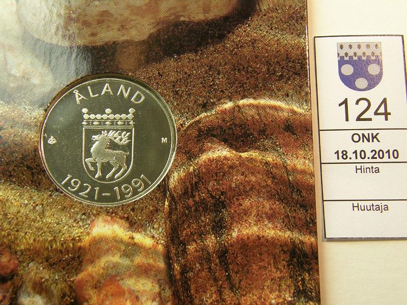 kohde_124_a.jpg - Kohde 124, lhthinta: 16 € 100 mk 1991 Ag, Ahvenanmaa, pahvikansiossa, kunto: 9.