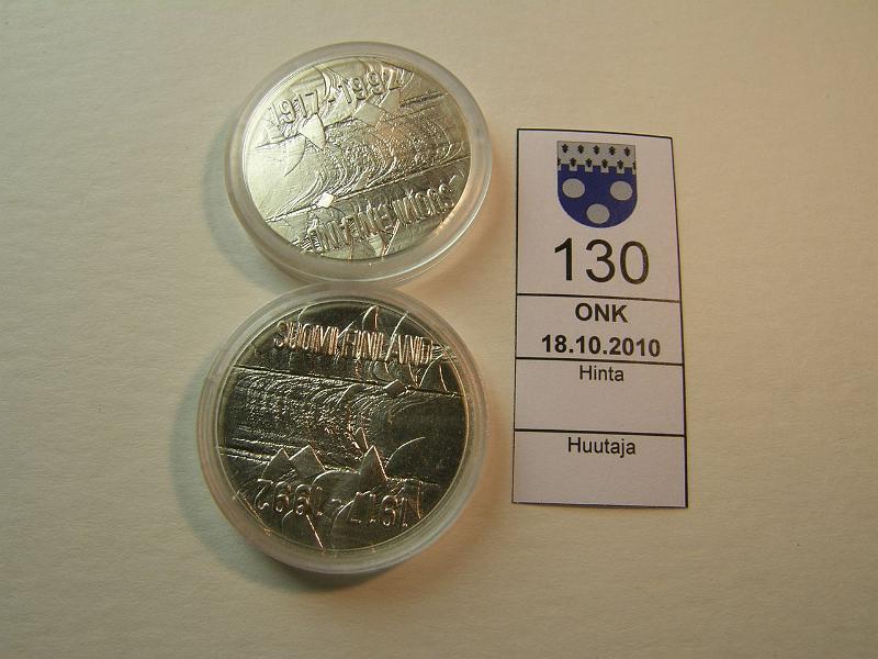 kohde_130_a.jpg - Kohde 130, lhthinta: 20 € 100 mk 1992 (2) Ag, Suomi 75 v, kapseleissa vikoja, kunto: 9.