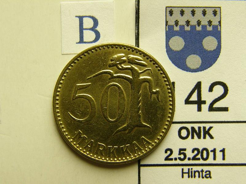 kohde_142_b.jpg - Kohde 142, arvopuoli, lhthinta: 65 € 50 mk 1958 l.puhd, kunto: 8.