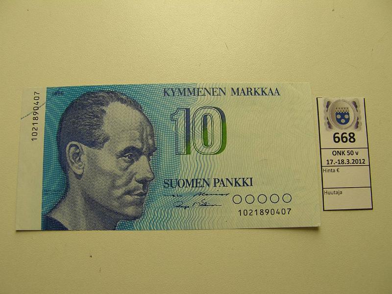 k-0668-a.jpg - Kohde 668, lhthinta: 150 € 10 mk 1986 SNY 148.1 1021890407 AL I-M1. Vas. ylkulmassa sininen painomustekaari, kunto: 8