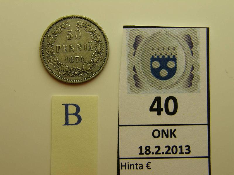 k-0040-b.jpg - Kohde 40 (kuva 2/2), lhthinta: 20 € 50 p 1874 Ag, kunto: 6