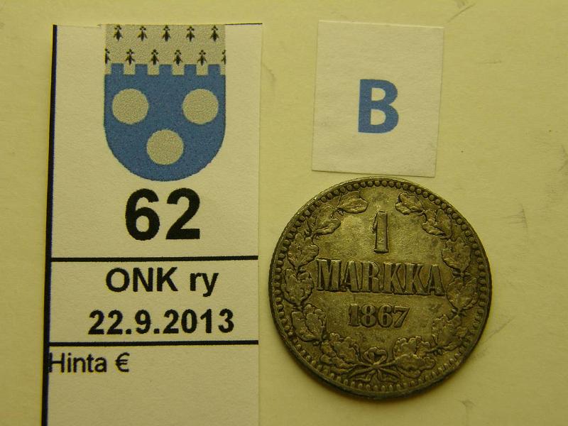 k-0062-b.jpg - Kohde 62 (kuva 2/2), lhthinta: 15 € / myyntihinta: 17 € 1 mk 1867 Ag, SNY 400.1, vaakunap. viisto alareuna, metallivika vai painuma?, kunto: 3