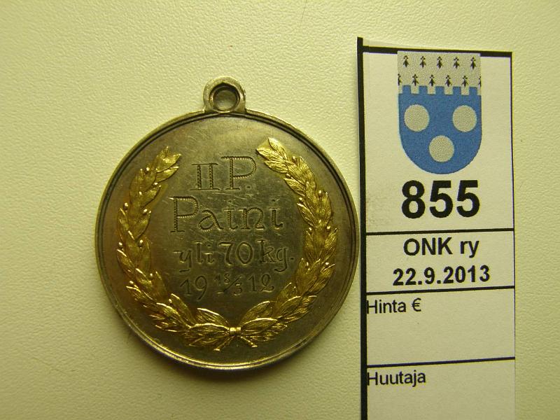 k-0855-b.jpg - Kohde 855 (kuva 2/2), lhthinta: 70 € Suomi 1912 Vaalea metalli, ripustettava, II palkinto paini >70kg 18.3.1912, kullanvriset tammenlaehvt, hnja. 1897 W.&U.S. REIPAS HELSINKI. Erikoinen autonomian ajan mitali!, kunto: 8