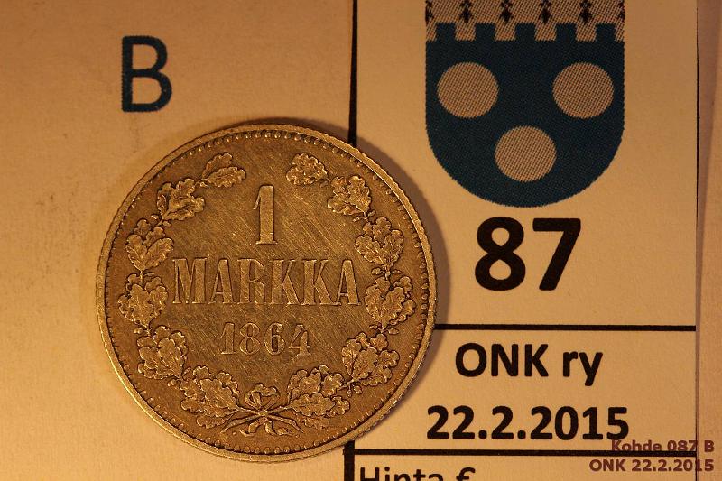 k-0087-b.jpg - Kohde 87 (kuva 2/2), lhthinta: 100 € / myyntihinta: 155 € 1 mk 1864 Ag, SNY 397.2 uusi rihlaus, pij, kunto: 5