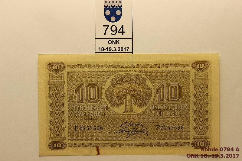 k-0794-a.jpg - Kohde 794, lhthinta: 25 € / myyntihinta: 32 € 10 mk 1922 SNY 143.1 F0757596 BA II-His, harv. ak pari (v), kaksi kevytt keskitaitetta ja nurkkataite, klemmarista ruostevri, kunto: 5