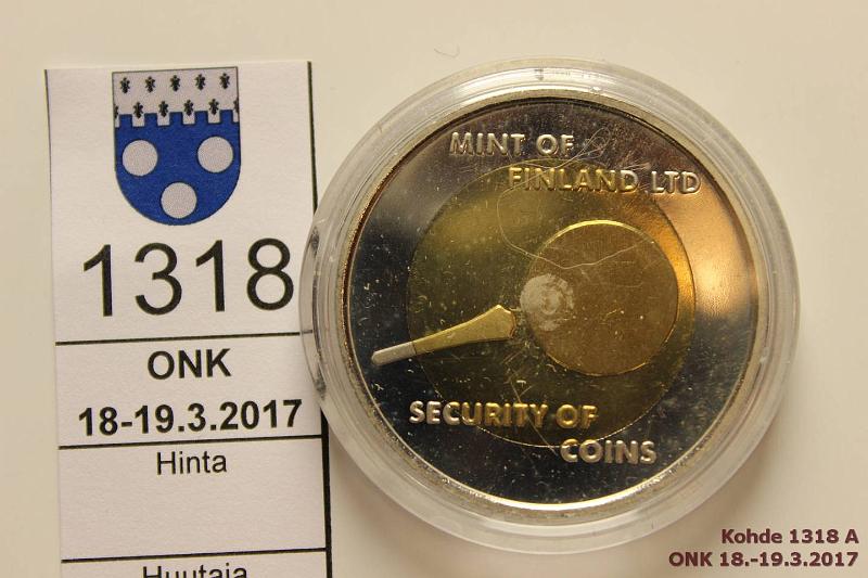 k-1318-a.jpg - Kohde 1318 (kuva 1/2), lhthinta: 4 € / myyntihinta: 7 € Security of coins 1997 2-metalli mitali: Mint of Finland LTD, Interpol OIPC ICPO, Helsinki. Hpja. Kapseli, kunto: 8