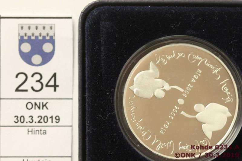 k-0234-a.jpg - Kohde 234, lhthinta: 10 € / myyntihinta: 30 € Latvia 1 lats 2006 KM#76 Ag, proof, 31,47g/925. Riga Ice Hockey World Championship, laatikko, tod, kunto: 10