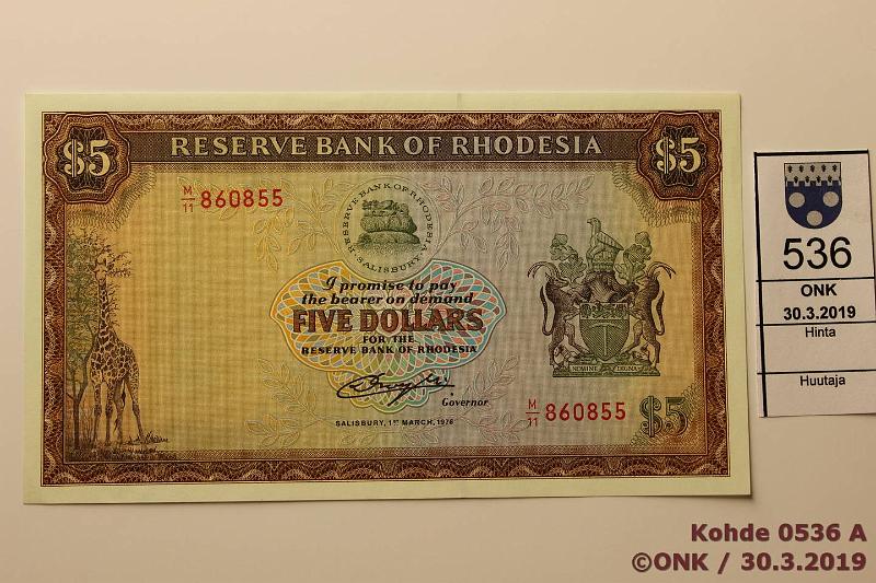 k-0536-a.jpg - Kohde 536 (kuva 1/2), lhthinta: 50 € / myyntihinta: 50 € Rhodesia 5 $ 1976 P#36a Klemmarin painauma, kunto: 9