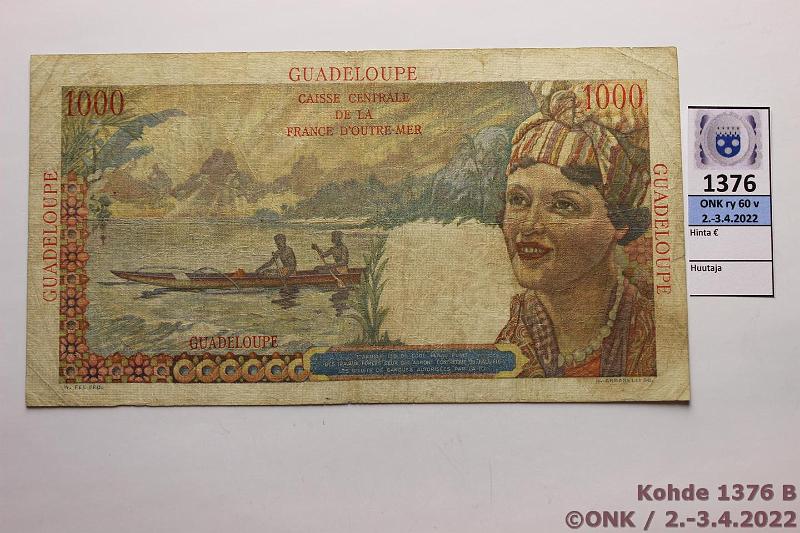 k-1376-b.jpg - Kohde 1376 (kuva 2/2), lhthinta: 115 € / myyntihinta: 115 € Guadeloupe 1000 fr ND P#37a 43421, niitinreit, prep, likaa, kunto: 4