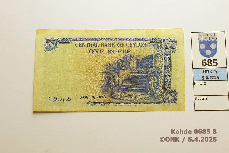 k-0685-b.jpg - Kohde 685 (kuva 2/2), lhthinta: 40 € Ceylon 1 rup 1952 P#49 Silitetty, tahroja, kunto: 5