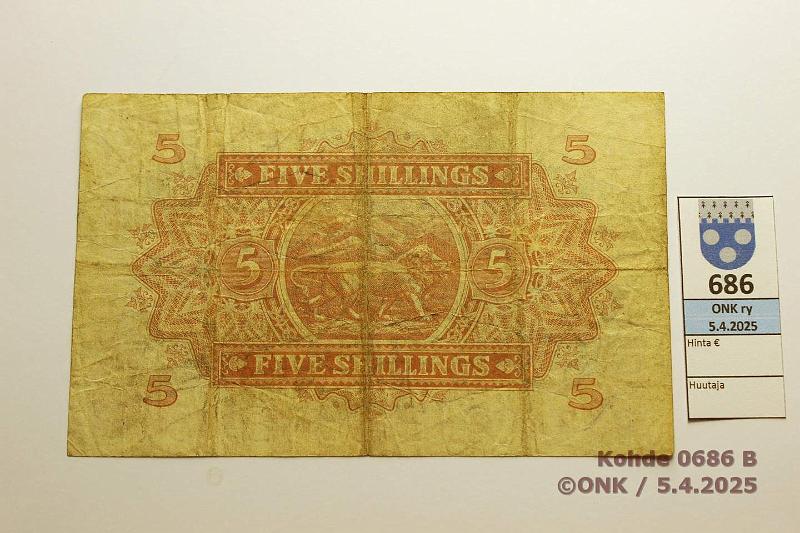 k-0686-b.jpg - Kohde 686 (kuva 2/2), lhthinta: 30 € East Africa (EACB) 5 shillings 1955 P#33 6mm rep, kunto: 4