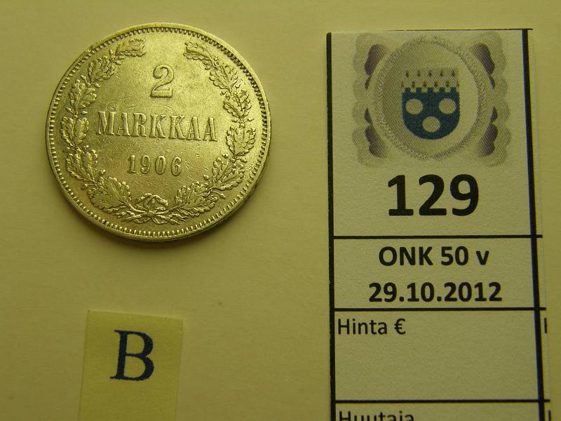 k-0129-b.jpg - Kohde 129 (kuva 2/2), lhthinta: 30 € 2 mk 1906 Ag, SNY 500.1 (pitk /), kunto: 5