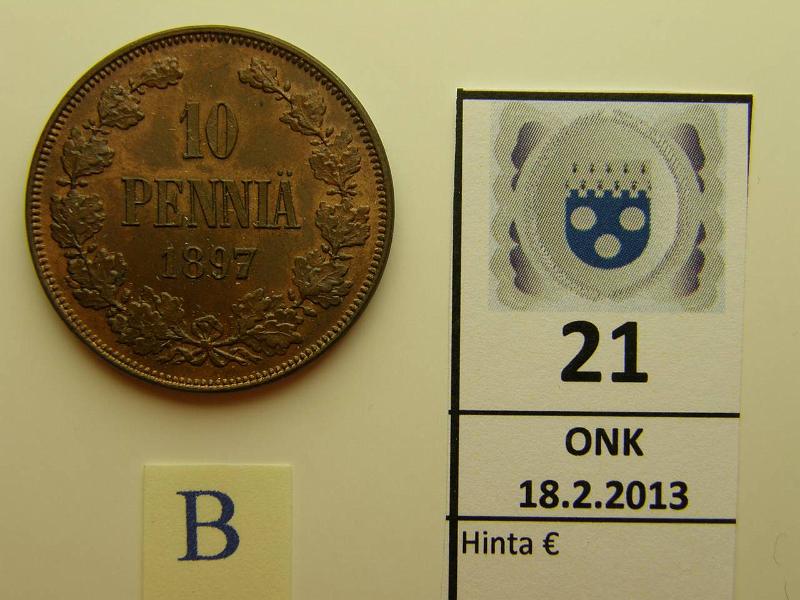 k-0021-b.jpg - Kohde 21 (kuva 2/2), lhthinta: 100 € 10 p 1897 kulumaton raha, runsaasti leimakiiltoa. Erittin kaunis!, kunto: 8