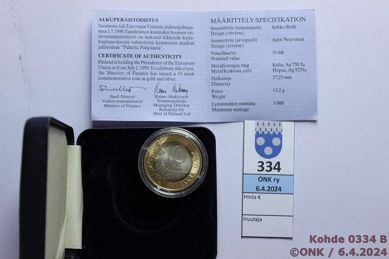 k-0334-b.jpg - Kohde 334 (kuva 2/2), lhthinta: 350 € / myyntihinta: 360 € 10 mk 1999 Au/Ag 750/925, Proof. Kotelo+tod. Au/Ag rajalla rahalle tyyypillinen patina, kunto: 9